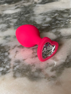 Рожева силіконова анальна пробка Періс розміру С зі стопером-сердечком